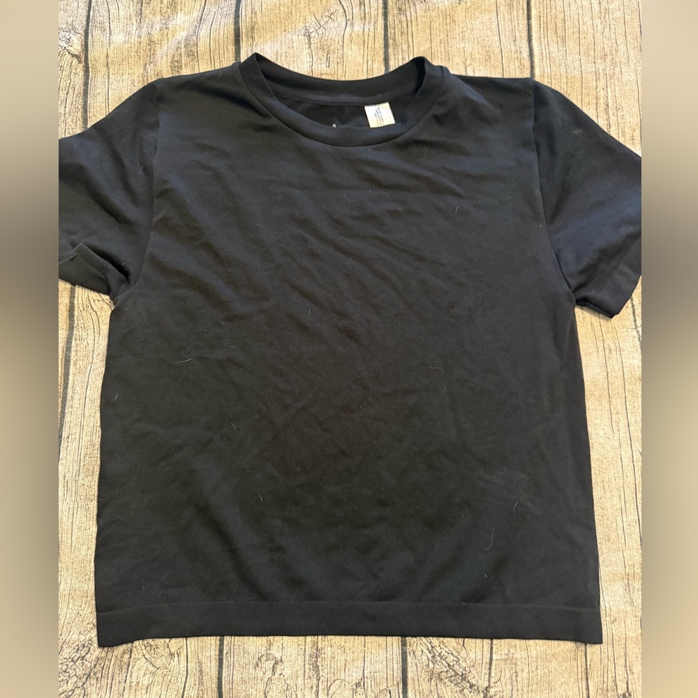 Short sleeve tee. Black. Form fitting, thick stretchy spandex blend